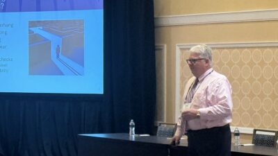 Frank Russo of Russo Structural Services presents the AISC NSBA Standard Bridge Plans at the 2026 International Bridge Conference, highlighting optimized steel I girder solutions for common bridge configurations.