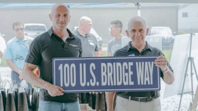 U.S. Bridge’s 90th anniversary celebration included the official renaming of its longtime address to 100 U.S. Bridge Way, honoring the company’s employees, customers and communities.