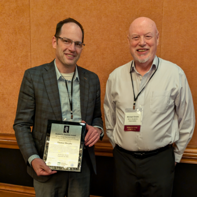 Mike Grubb, M.A. Grubb & Associates, LLC, right, presents the 2026 Richard S. Fountain Award to Thomas P. Murphy, PhD, PE, SE, of Modjeski and Masters.