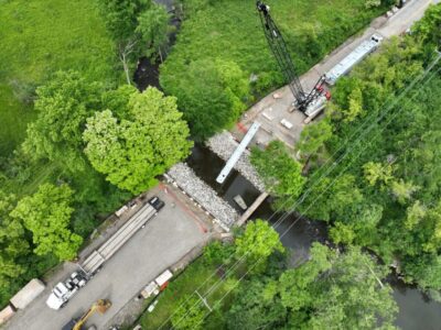 Aerial view of the Cherry Hill Road Bridge replacement in Washtenaw County, Michigan, featuring six galvanized press-brake tub girders supplied by Nelson Bridge Systems. Photo Credit: Washtenaw County Road Commission